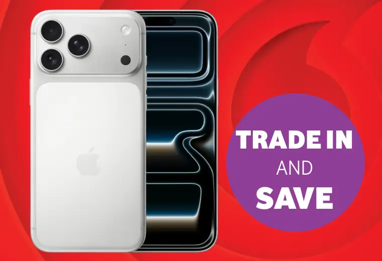 A promotional graphic on a red background featuring the front and back of a white iPhone. A prominent purple circular badge on the right side contains the text "TRADE IN AND SAVE" in bold white capital letters. The Vodacom logo is subtly visible in the background design.
