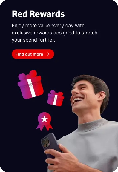 Man laughing while looking at a smartphone with Red Rewards graphic icons of gift boxes and a star badge.